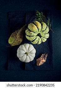 An Arrangement Of Edible Pumpkin And Dry Fall Leaves. Flat Lay