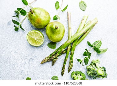 An Arrangement Of Green Vegetables,  Fruits And Herbs; Flatlay