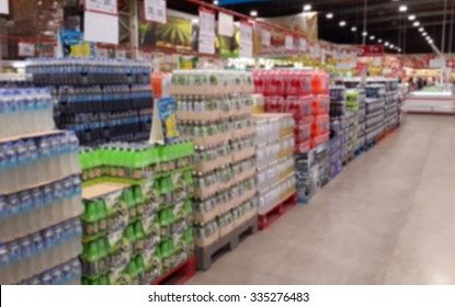 Arrangement Of Soft Drink Displayed In A Wholesale And Retail Hyper Market, Blurred