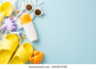 An arrangement of summer beach essentials including yellow sandals, sunglasses, and sunscreen on a vibrant light blue background - Powered by Shutterstock