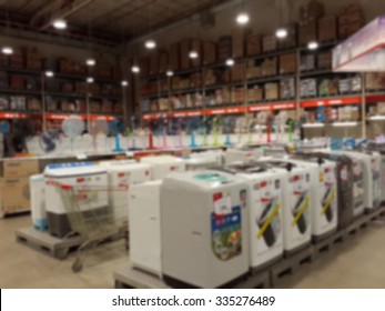 Arrangement Of Washing Machine Displayed In A Wholesale And Retail Hyper Market, Blurred