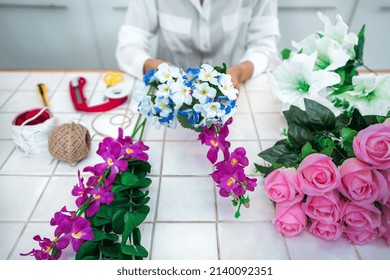 Arranging Artificial Flowers Decoration At Home, Young Woman Florist Work Making Organizing Diy Artificial Flower, Craft And Hand Made Concept.