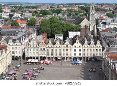 Arras, France - May 28, 2017: People sit at restaurants on the Place des Heros market place or town square in Arras in France on May 28, 2017