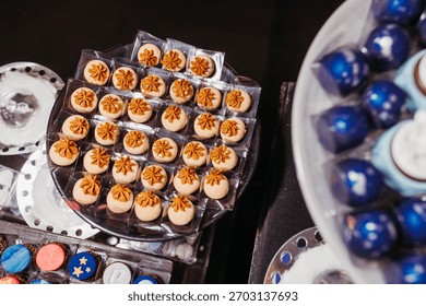 An array of assorted cupcakes displayed on a tray