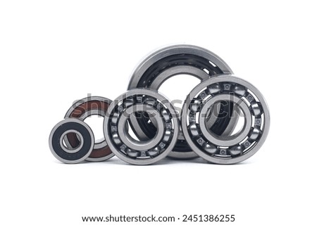 Array of bearings of varying sizes and types, including with and without sealing isolated on a white background