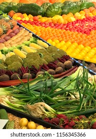 Array of fruit and vegetables on display in a variety of colours