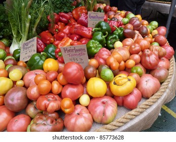 Array Of Heirloom Tomatoes And Fall Vegetables