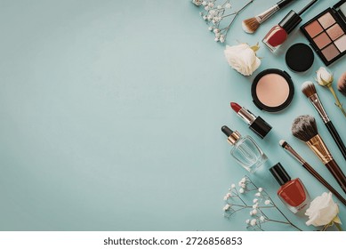 An array of makeup essentials including lipsticks, nail polishes, makeup brushes, eyeshadow palettes, and foundation bottles arranged on a light blue background with white flowers.