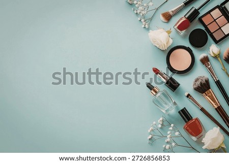 An array of makeup essentials including lipsticks, nail polishes, makeup brushes, eyeshadow palettes, and foundation bottles arranged on a light blue background with white flowers.