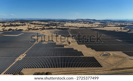 Array of solar panels on farmland in regional Victoria