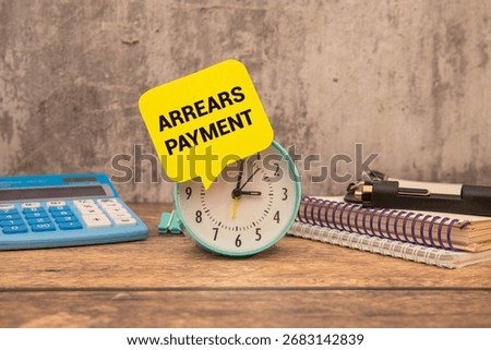 Arrears payment is shown using a text as financial concept