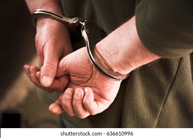arrested man hands close up