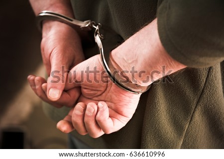arrested man hands close up