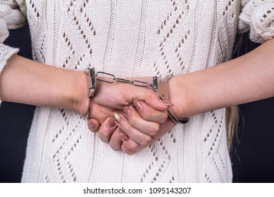 Arrested Woman In Handcuffs