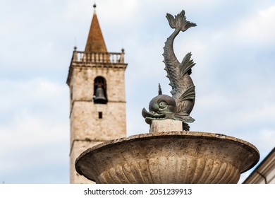 Arringo-Square,Marche,Italy - October,07,2016 - Copper Koi Fish Sculpture Fountain