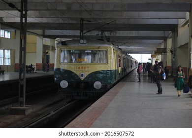 The Arrival Of A Local Train Into The Railway Station (narrow Focused Low Light Photo) In Chennai, Tamil Nadu. India. Dec 2018