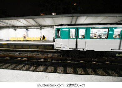 Arrival Of A Parisian Subway In A Parisian Metro (metropolitain) Station (Passy, Line 6) In Paris, France On September 16, 2022.