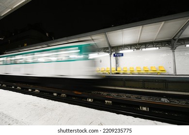 Arrival Of A Parisian Subway In A Parisian Metro (metropolitain) Station (Passy, Line 6) In Paris, France On September 16, 2022.