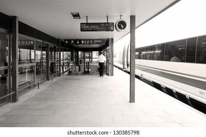 Arrival platform of a high speed train black and white