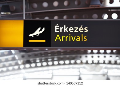 Arrivals airport sign in Hungary with Hungarian text
