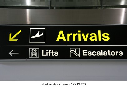 Arrivals, lifts and escalators signs at Dublin International Airport