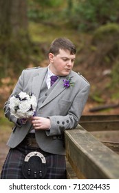 ARROCHAR, SCOTLAND - JANUARY 19, 2017: A Newly Married Groom Standing For A Portrait In His Family Kilt