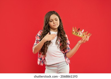 Arrogant Child With Curly Hair Hold Queen Crown On Red Background, Contest