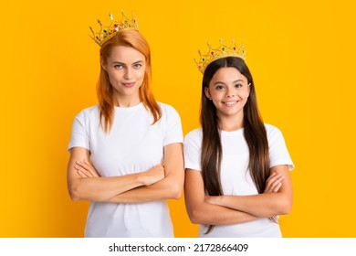 Arrogant Mother And Daughter Child Wearing Crowns On Yellow Background, Selfish. Studio Portrait Of Teen Princess.