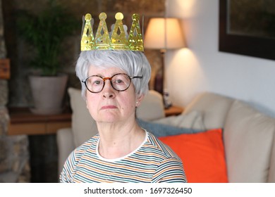 Arrogant Senior Woman Wearing A Crown