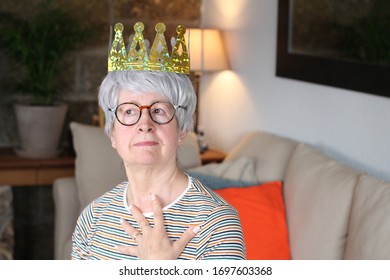 Arrogant Senior Woman Wearing A Crown