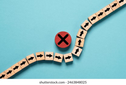 Arrow avoid cross mark which it print screen on wooden block for Avoid problem and find optimize solution to solving concept.
