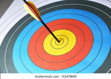 Arrow in the center of target for archery, closeup