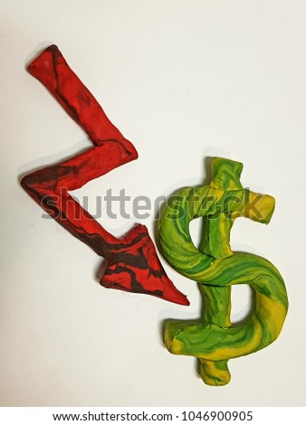 arrow down red with a pesos symbol, figures in plasticine 