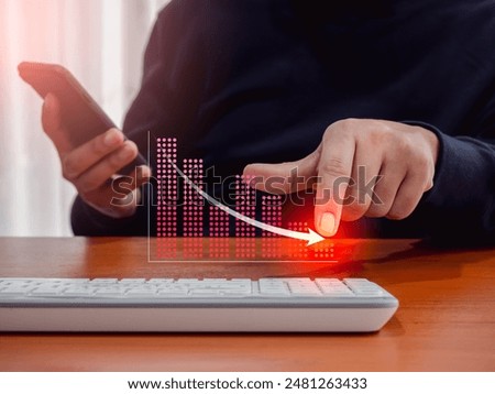Arrow drop down, draw by businessman hand while using smartphone, on digital red decrease business graph, virtual screen chart diagram. Financial crisis, bankruptcy, loss investment economic concepts.