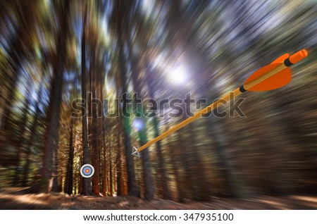 Arrow flying to target with radial motion blur