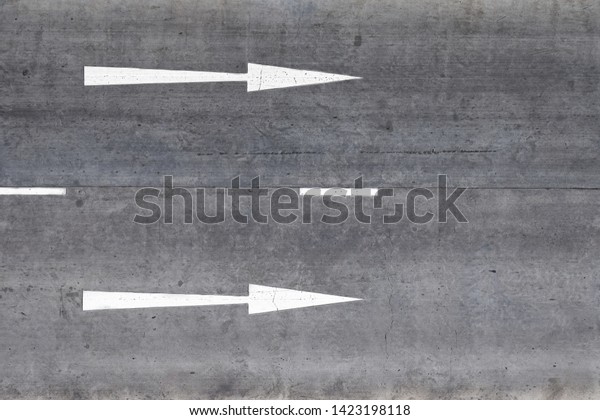 Top​view​ of​ White​ Arrow Go\
straight  on​ the​ road​ and​ for​ background .Signs way on the car\
park.
