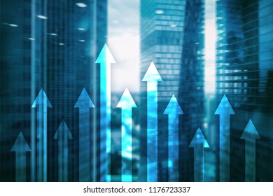 Up arrow graph on skyscraper background. Invesment and financial growth concept.