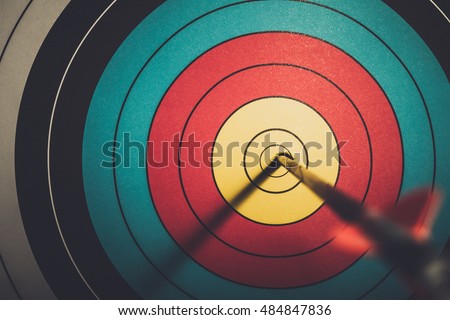 Arrow hit goal ring in archery target vintage style
