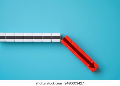 The arrow is moving down. Concept of fall and failure in business and finance. Adversity. Be aware of the difficulties. Management of risks.