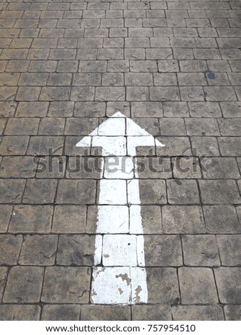 Up arrow on the road