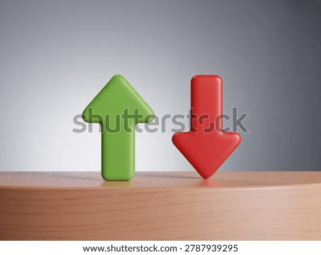 arrow pointing up and red arrow pointing down on a wooden surface