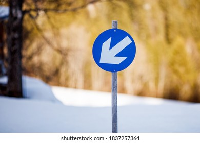 Arrow Sign On Ski Piste