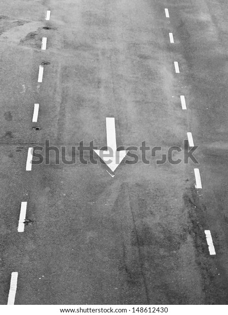 Arrow signs as road
markings on a street