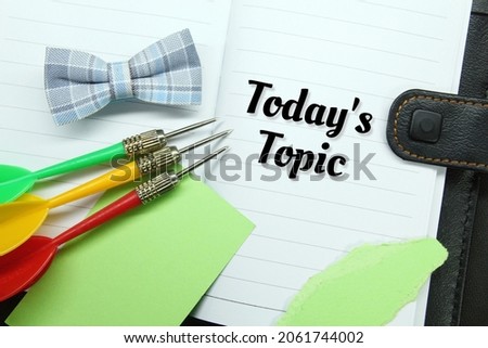 arrows, notebooks, papers with today’s topic words