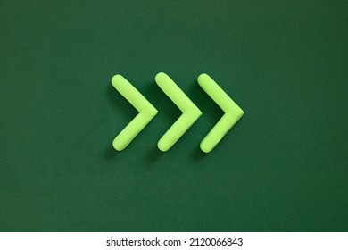 Arrows pointing right side. 3D mockup, pointer sign pointing direction on green background. Right way concept. - Shutterstock ID 2120066843
