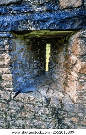 Arrowslits in an old castle wall