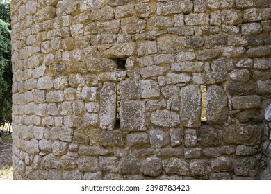the arrowslits at the wall