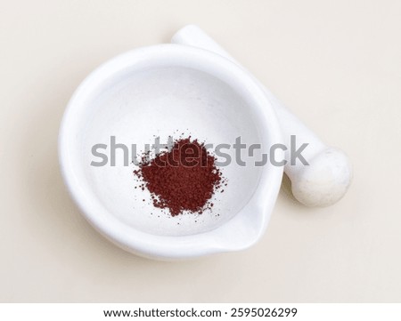 Arsenazo 1, a complexometric indicator is an ionochromic dye that undergoes a definite color change in presence of specific metal ions.