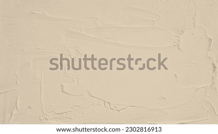 Art Acrylic smear blot brushstroke painting wall. Abstract relief texture beige neutral color stain copy space canvas background.