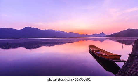 art of beautiful sunset in Ta Tunh Na dam and lake, Kanchana Buri, Thailand